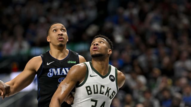  Dallas Mavericks forward Grant Williams (3) and Milwaukee Bucks forward Giannis Antetokounmpo (34) look for the rebound d